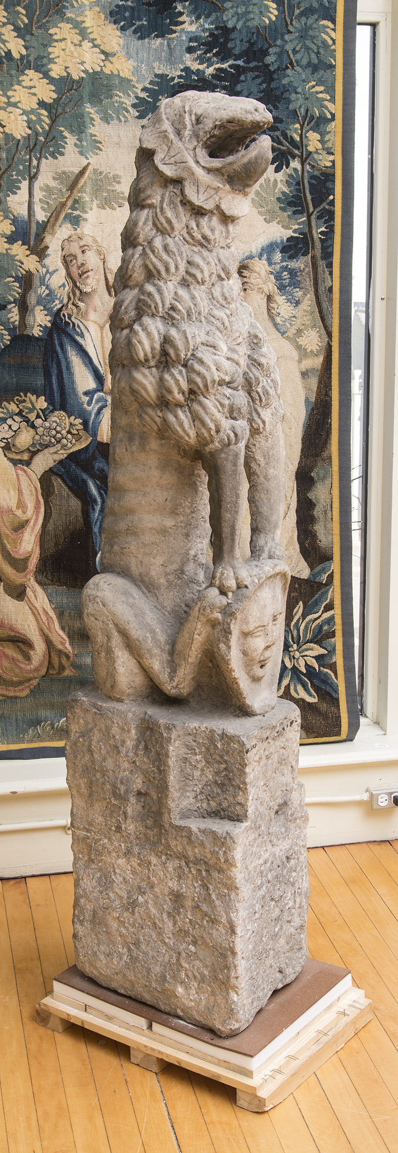 Appraisal: EUROPEAN CARVED STONE MODEL OF A LION-FORMED GARGOYLE Sitting on