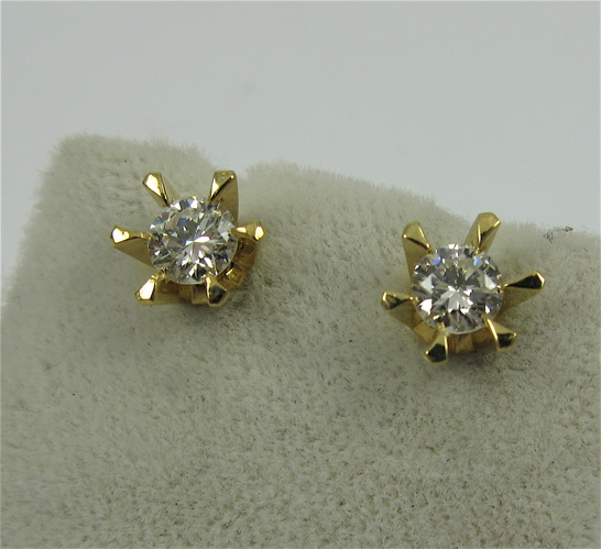 Appraisal: PAIR OF DIAMOND AND K GOLD EAR STUDS each set