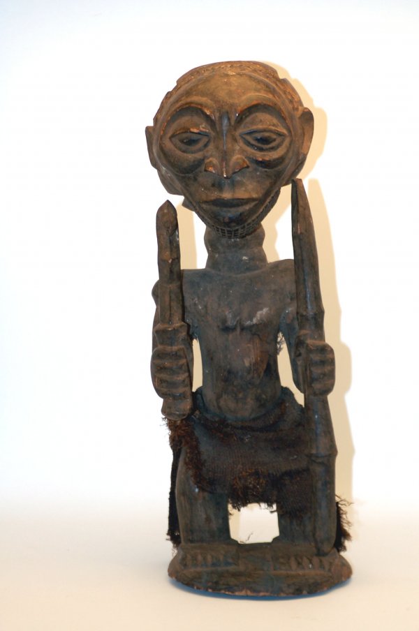 Appraisal: Large Hemba warrior figure having short legs an elongated torso