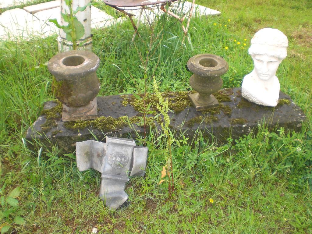 Appraisal: A small stone Urn another smaller lead drainage cistern bust