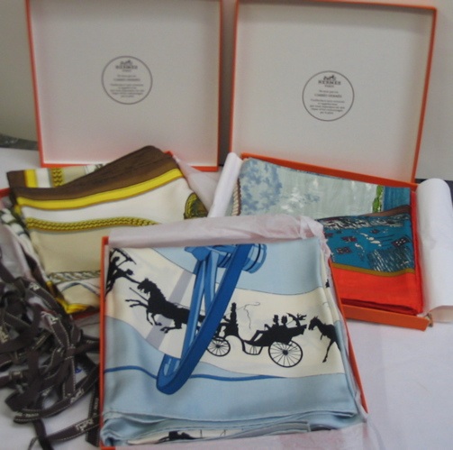 Appraisal: THREE HERMES-PARIS SILK SCARVES one with parade horses gold and