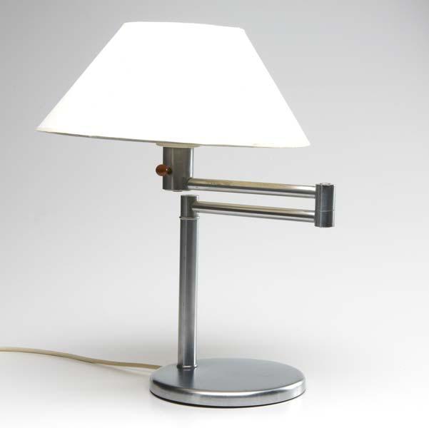 Appraisal: WALTER VON NESSEN Swing-arm table lamp in brushed chrome with