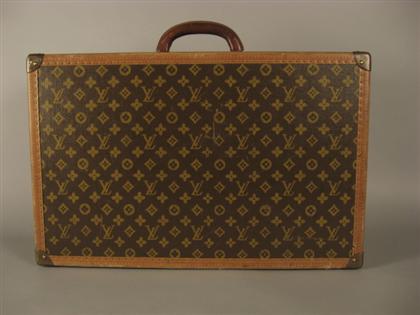 Appraisal: Louis Vuitton suitcase th century Hard-sided signature LV monogram canvas