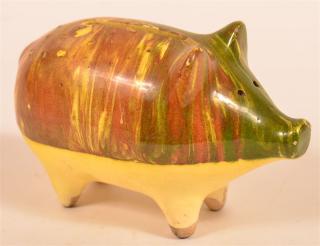 Appraisal: Green Yellow and Brown Mottle Glazed Earthenware Pig Form Bank