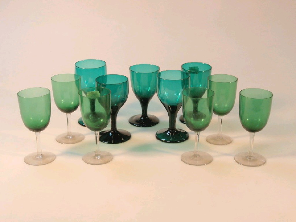 Appraisal: A set of eleven emerald green glass wine glasses six