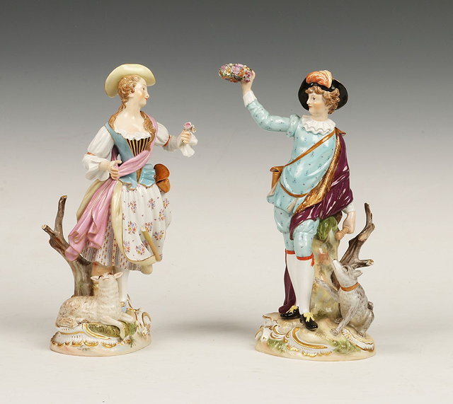 Appraisal: A PAIR OF MEISSEN PORCELAIN FIGURES of a boy and