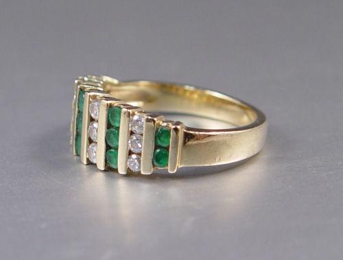 Appraisal: K EMERALD DIAMOND RING K yellow gold ring contains twelve