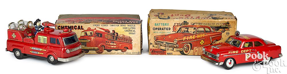 Appraisal: Two Cragstan battery-operated fire vehicles Two Cragstan battery-operated fire vehicles