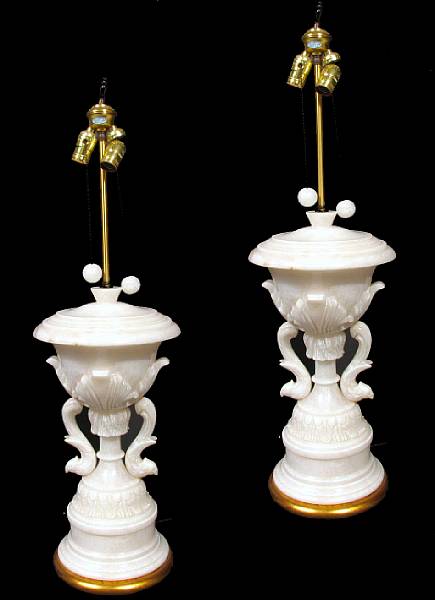 Appraisal: A pair of Neoclassical style carved alabaster table lamps height