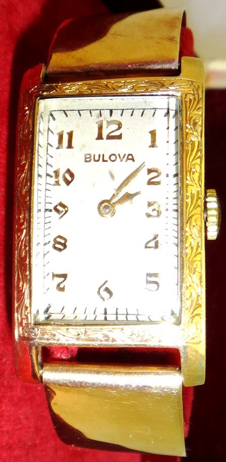 Appraisal: A gentleman's gilt metal rectangular cased Bulova wristwatch the signed