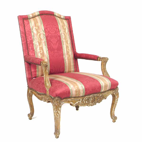 Appraisal: An Italian Rococo style carved and parcel gilt armchair with