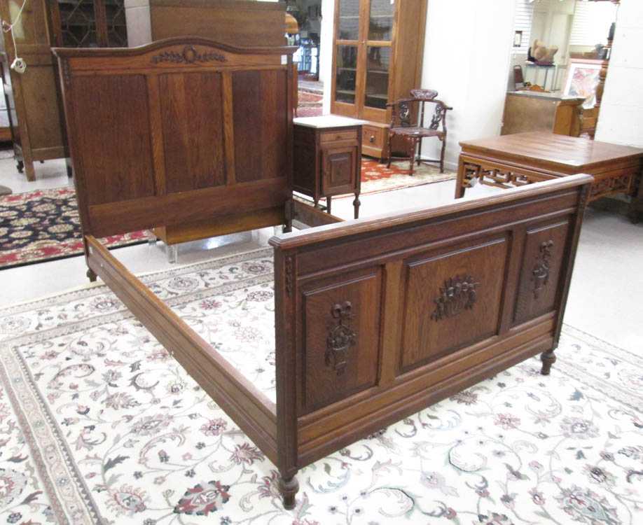 Appraisal: LOUIS XVI STYLE OAK BED AND NIGHTSTAND SET Continental late