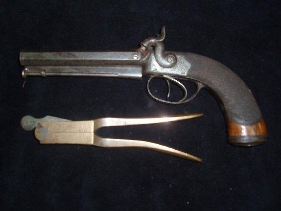 Appraisal: A double barrelled percussion cap pistol Samuel Cashmore muzzle loading