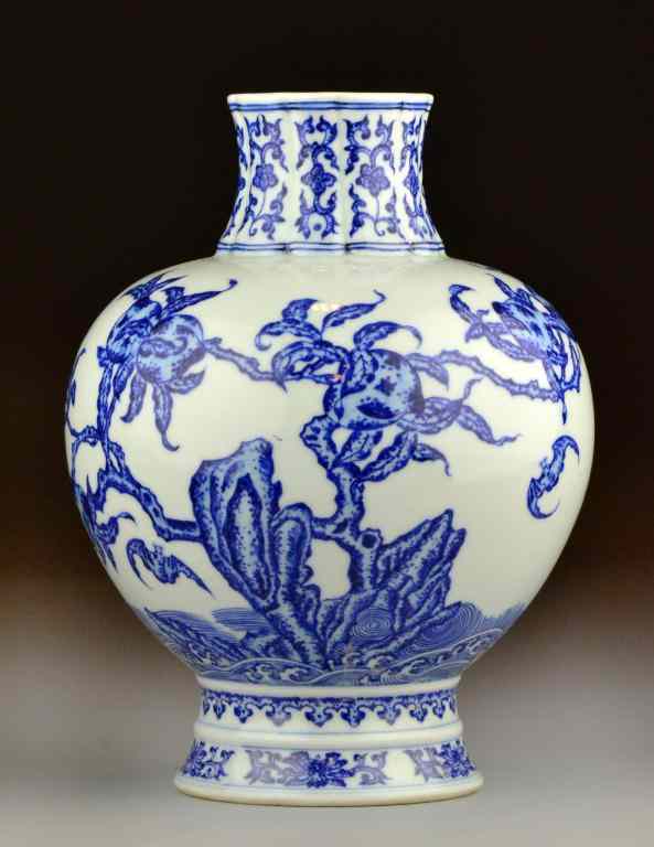 Appraisal: Chinese Blue White Porcelain Bat Fruit VaseBulbous blue and white