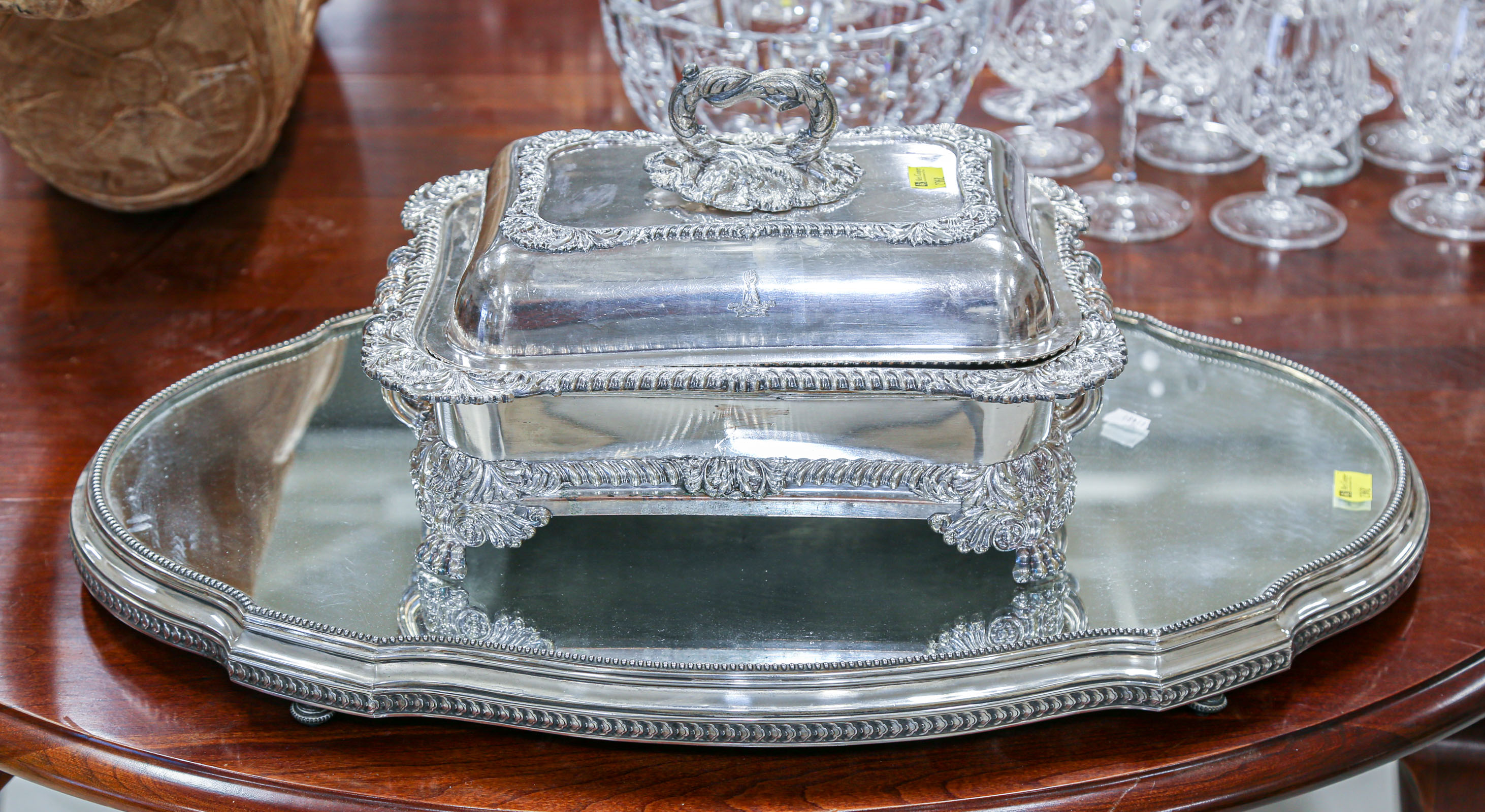 Appraisal: MIRRORED SILVER PLATE PLATEAU WARMING DISH Comprising an English mirrored