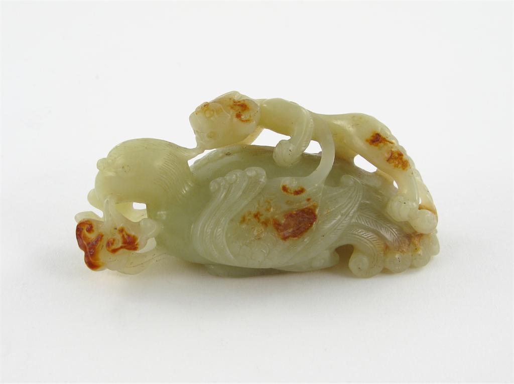 Appraisal: A Chinese yellow jade carving of a phoenix