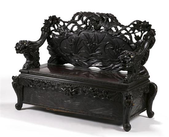 Appraisal: ORIENTAL CARVED BENCH Asian th century ebonized wood Pierce carved