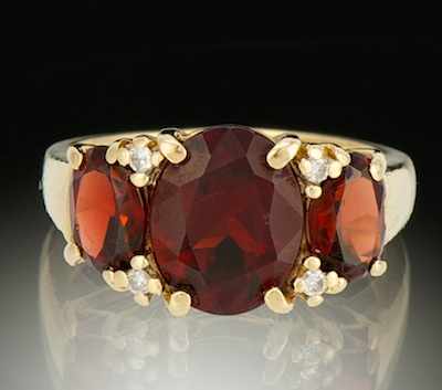 Appraisal: A Ladies' Garnet Ring k yellow gold ring set with