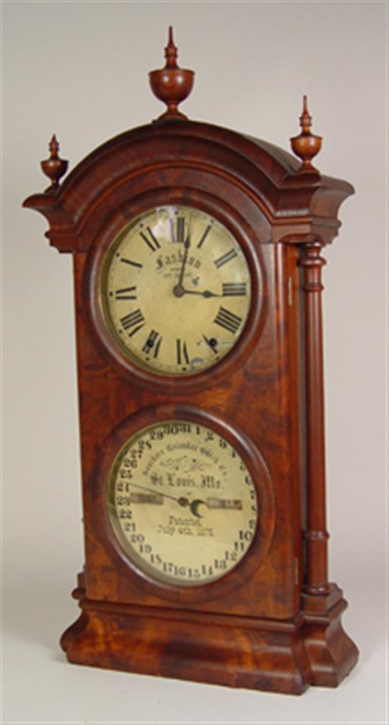 Appraisal: Southern Fashion Calendar Clock Pat Burl veneer walnut case with