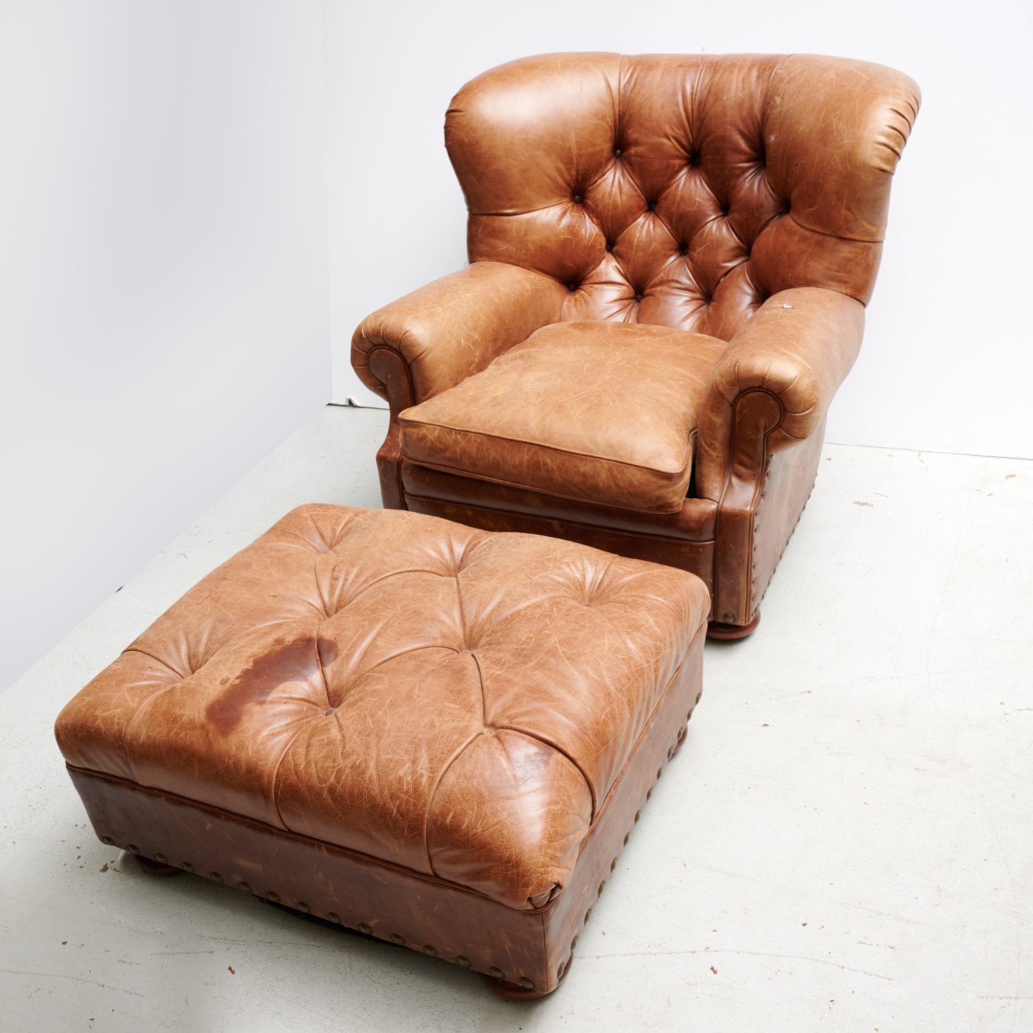 Appraisal: RALPH LAUREN BROWN LEATHER CLUB CHAIR AND OTTOMAN th st