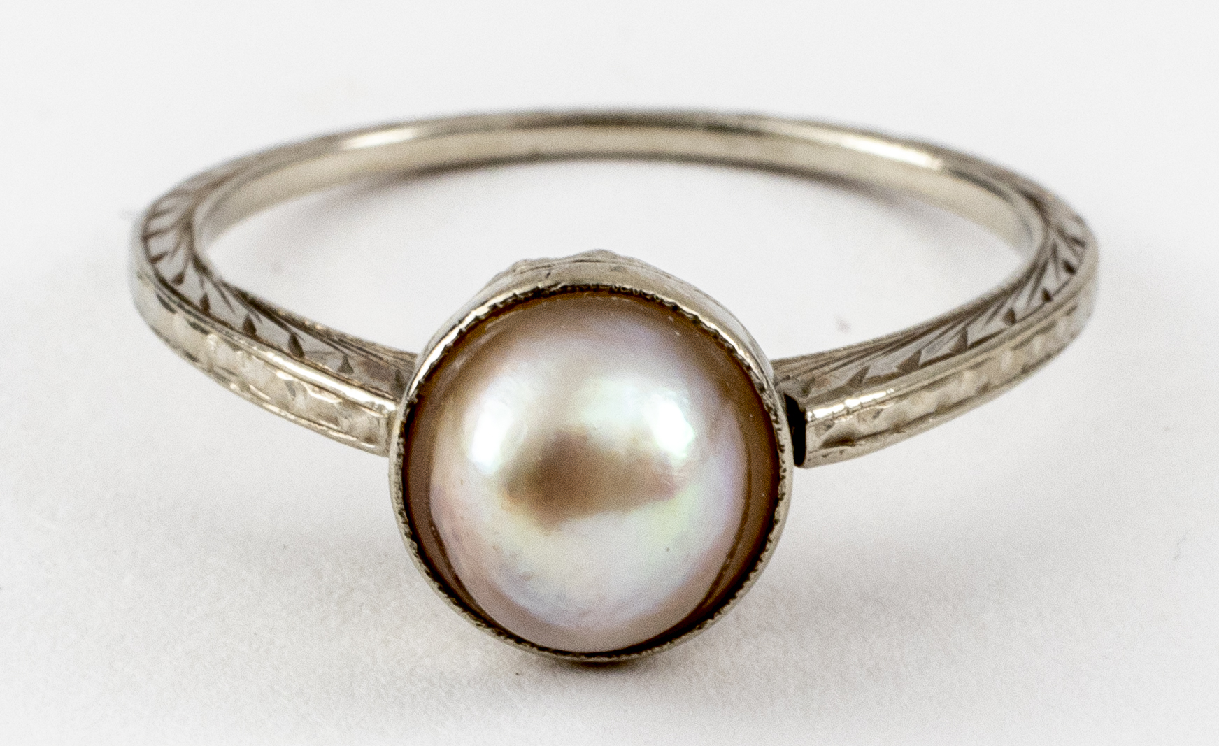 Appraisal: EDWARDIAN K WHITE GOLD FILIGREE PEARL RING Edwardian K white