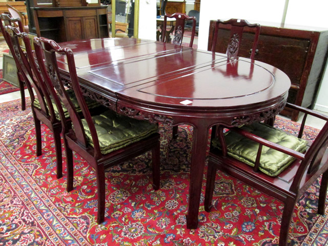 Appraisal: MING-STYLE ROSEWOOD DINING TABLE AND CHAIR SET Chinese th century