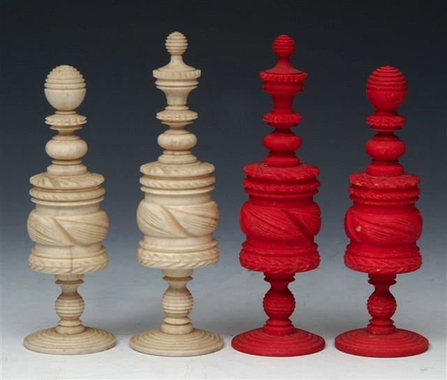 Appraisal: A TURNED IVORY CHESS SET with leaf decoration high