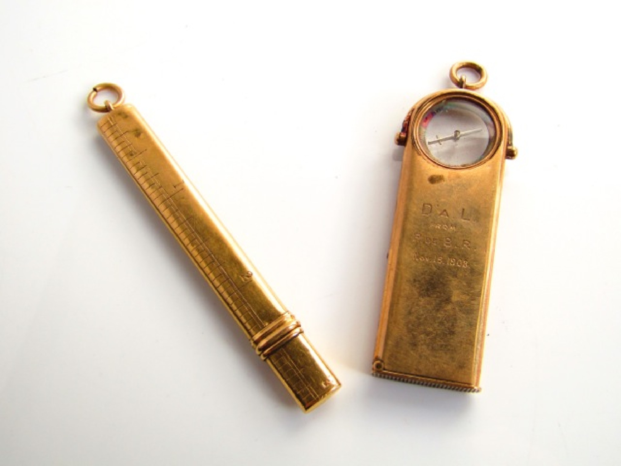 Appraisal: An ct gold pencil pendant one side with measuring ruler