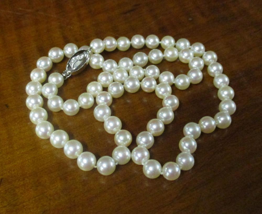 Appraisal: AKOYA PEARL AND FOURTEEN KARAT GOLD NECKLACE The hand-knotted necklace