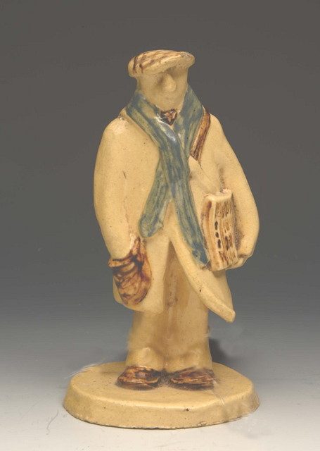 Appraisal: A CLAY FIGURE of a standing gentleman in flat cap