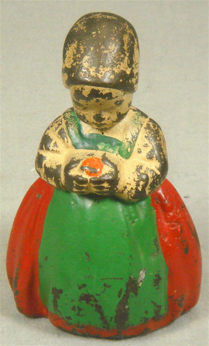 Appraisal: Cast iron doorstop little Dutch girl hollow overall paint wear