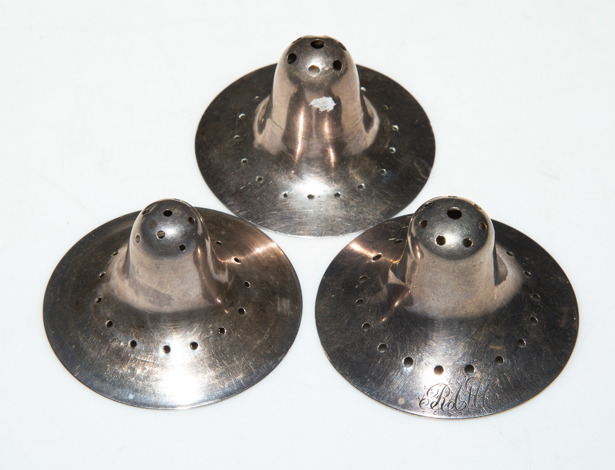 Appraisal: THREE RARE GEORGE III SILVER NIPPLE SHIELDS Two with London