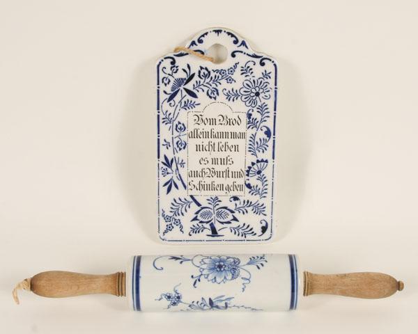 Appraisal: A German porcelain rolling pin and board with script both