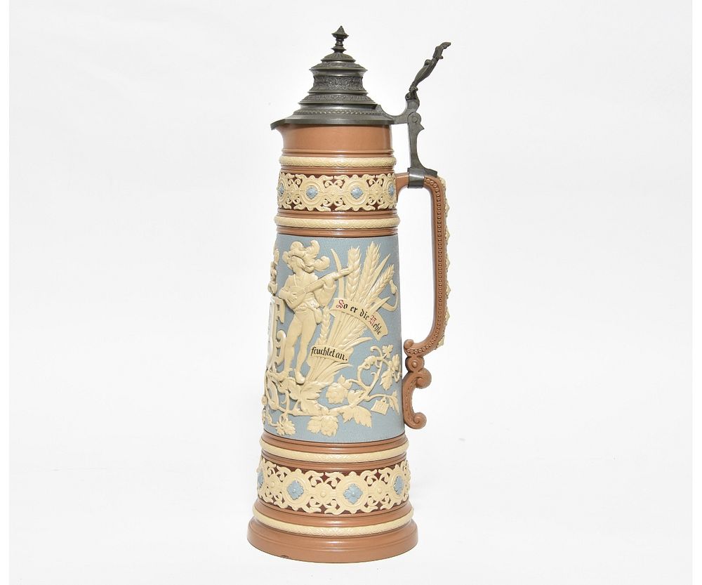 Appraisal: Mettlach Stein Mettlach three litre stein with relief figures and