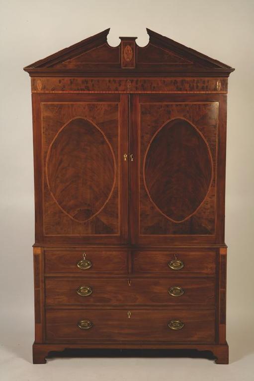 Appraisal: A GEORGE III MAHOGANY SHERATON STYLE LINEN PRESS the upper