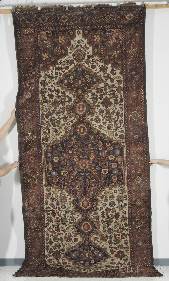 Appraisal: Southwest Persian Corridor Carpet late th century two small rewoven