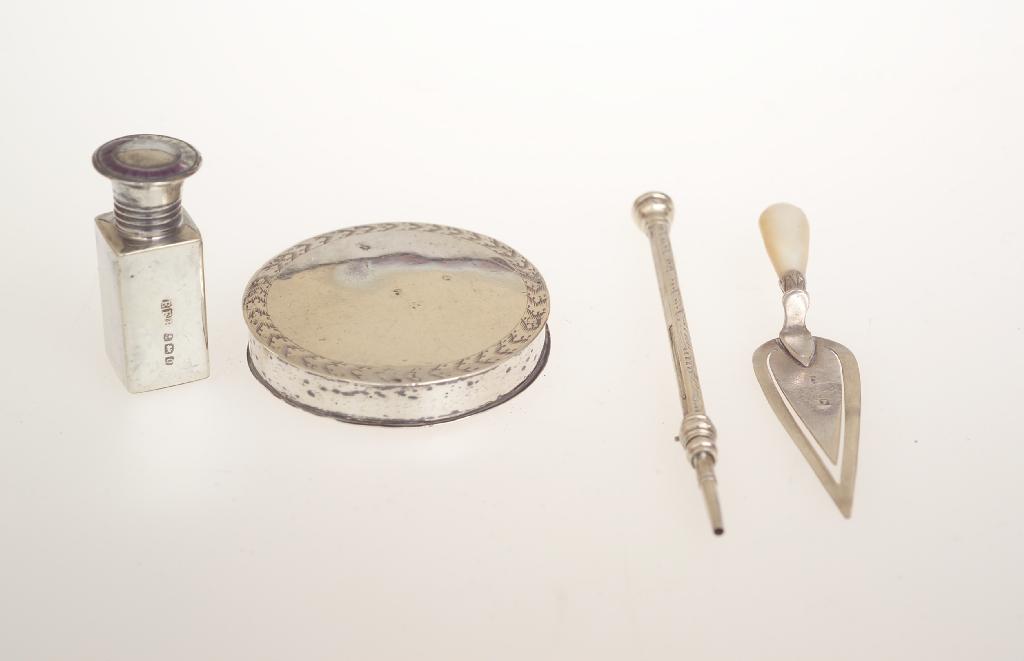 Appraisal: GROUP OF SMALL SILVER ITEMS comprising trowel-form bookmark with mother-of-pearl