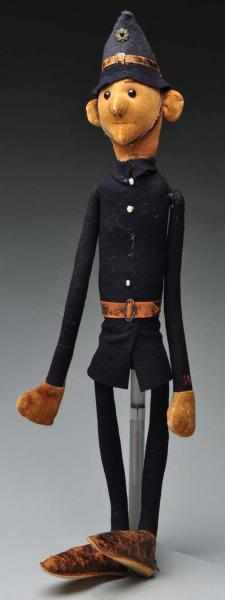 Appraisal: Early Caricature Policeman Doll Description No metal ear button but