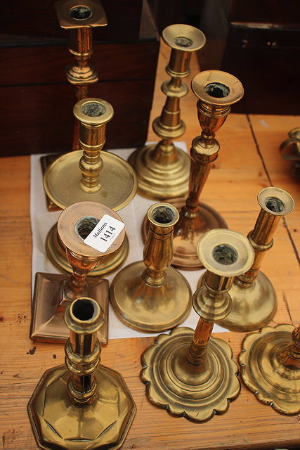 Appraisal: A COLLECTION OF TEN VARIOUS GEORGIAN AND LATER BRASS CANDLESTICKS