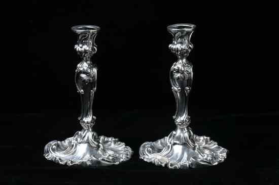 Appraisal: PAIR MINIATURE SWEDISH ROCOCO-STYLE SILVER CANDLESTICKS Circa Scrolling acanthus foot