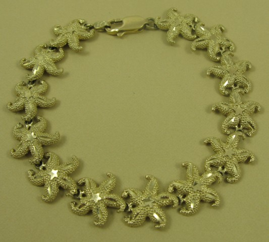 Appraisal: FOURTEEN KARAT GOLD STARFISH BRACELET - in length and weighing