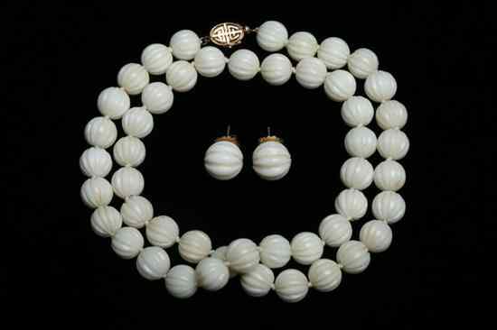 Appraisal: MATCHED MELON -CARVED WHITE CORAL BEAD NECKLACE WITH K YELLOW