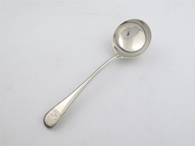 Appraisal: A Victorian sauce ladle Old English pattern with a bead