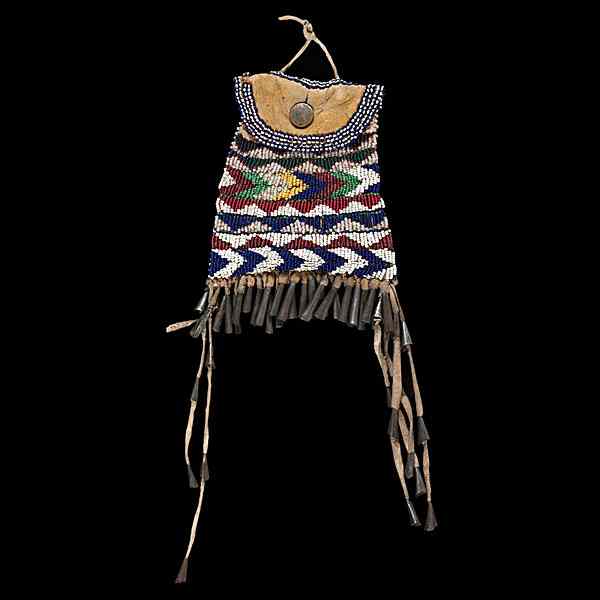 Appraisal: Apache Beaded Hide Strike-a-Light thread-sewn and beaded using colors of