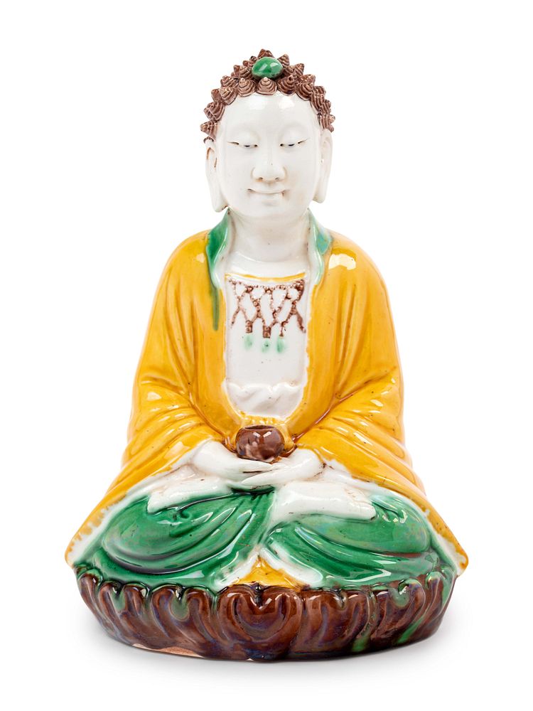 Appraisal: A Chinese Sancai Glazed Biscuit Figure of Buddha Shakyamuni A