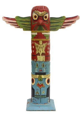 Appraisal: Carved parcel gilt and polychrome painted wood totem pole th