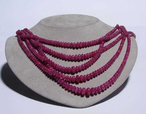 Appraisal: RUBY NECKLACE Casual-elegant -row necklace of numerous graduated ruby rondelles