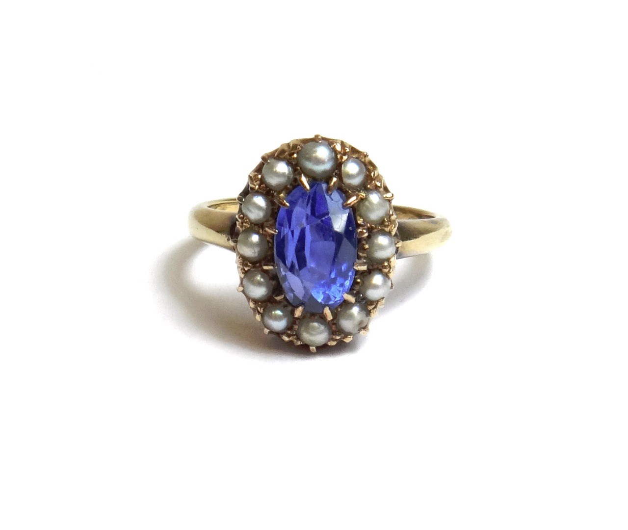 Appraisal: An ct gold sapphire and seed pearl set oval cluster