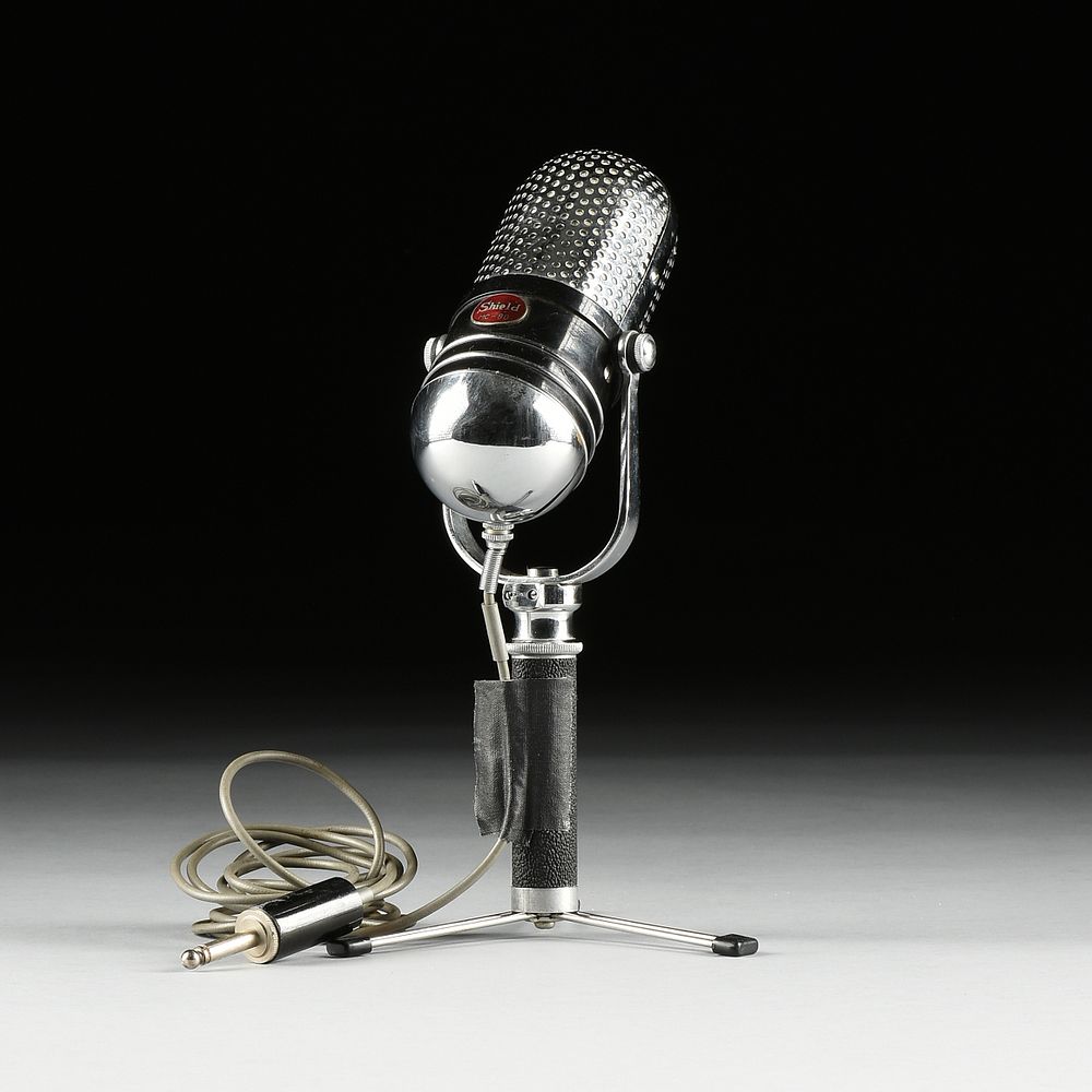 Appraisal: A VINTAGE SHIELD M- PILL FORM CHROME MICROPHONE - A