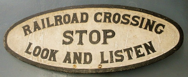 Appraisal: Oval cast iron railroad crossing sign x